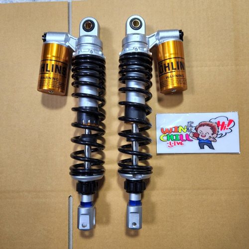 Sau khi nâng cấp XMAX, giảm sốc sau màu đen với túi vàng.